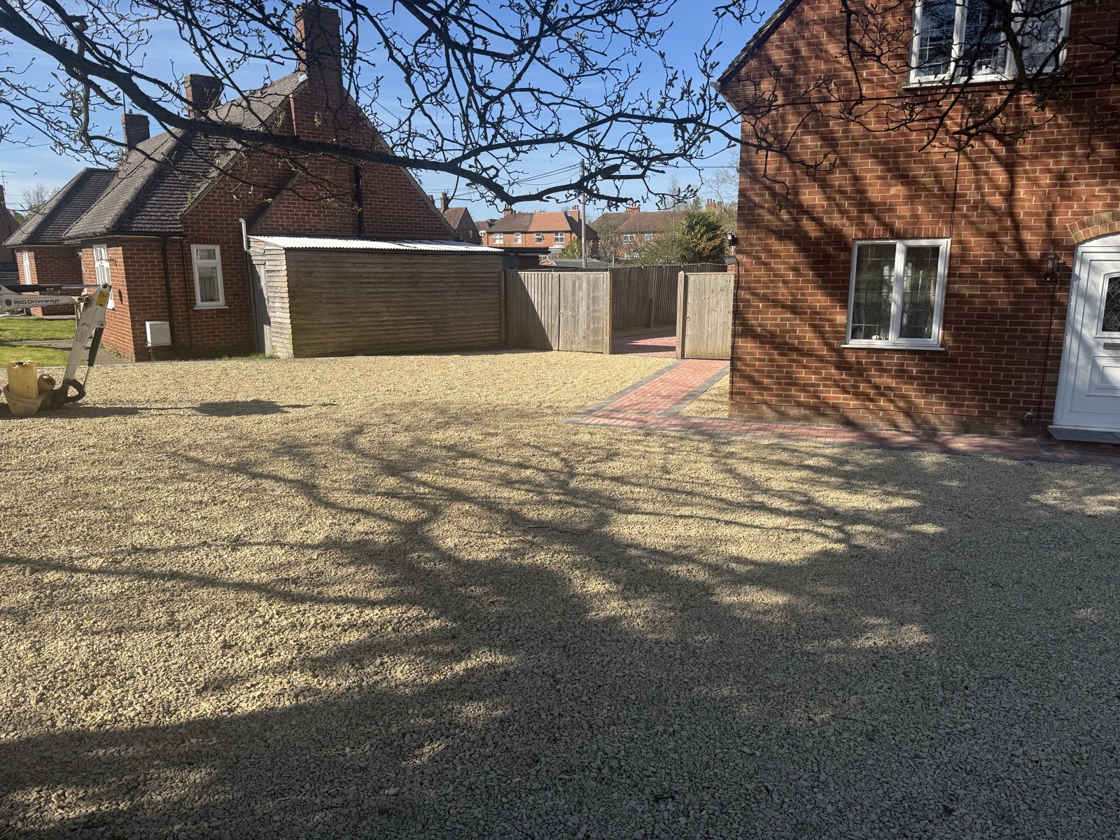 Shingle and gravel driveway